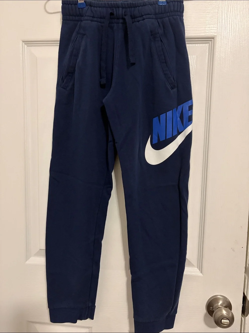 Nike Boys Navy Blue Jogger Sweatpants with White Swoosh and Blue Logo